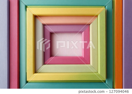 Colorful wooden frames arranged in concentric squares for display. 127094046