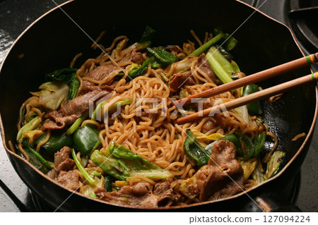 Fried noodles being cooked Fried noodles being cooked 127094224