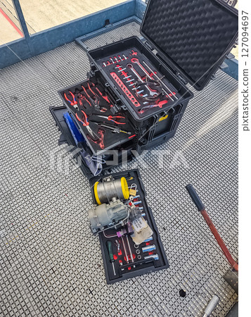 Aviation maintenance tool case with aircraft parts and mechanical instruments. High quality photo Aviation maintenance tool case with aircraft parts and mechanical instruments. High quality photo 127094697