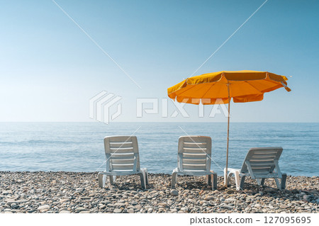 Sunny Beach with Loungers and Umbrella Sunny Beach with Loungers and Umbrella 127095695