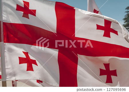Georgian National Flag Waving in the Wind Georgian National Flag Waving in the Wind 127095696
