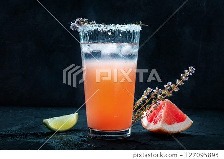 Salty Dog cocktail with fresh grapefruit juice, lime juice, and thyme Salty Dog cocktail with fresh grapefruit juice, lime juice, and thyme 127095893