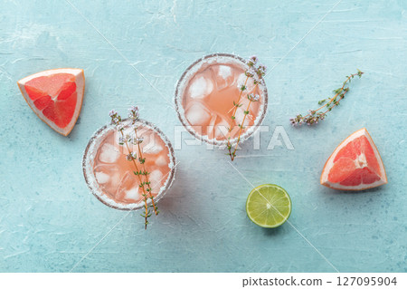 Salty Dog cocktail with fresh grapefruit juice, lime juice, and thyme Salty Dog cocktail with fresh grapefruit juice, lime juice, and thyme 127095904