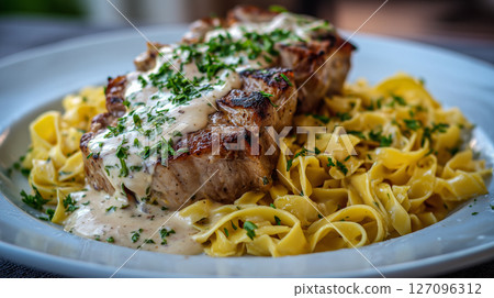 Creamy Pork Chop with Tagliatelle Pasta and Sriracha Infusion 127096312