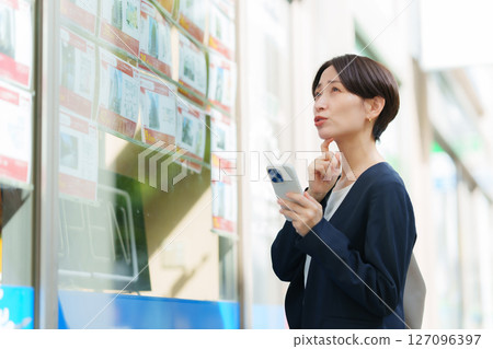 Woman looking for a property 127096397