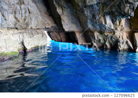 Republic of Malta, Malta Island, Grotto, Blue Grotto, view from a sightseeing boat, sparkling blue sea Republic of Malta, Malta Island, Grotto, Blue Grotto, view from a sightseeing boat, sparkling blue sea 127096625