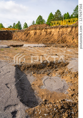 Plate load test results visible on soil surface after static pressure application. Ground investigation for foundation suitability and load-bearing capacity 127097568