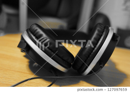 Desk Black headphones Desk Black headphones 127097659