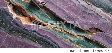 Semiprecious marble stone surface with vibrant mineral veins, colorful texture, abstract natural pattern, close-up view background 127097916