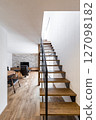 The open-air staircase and the bright living/dining room. Comment from the designer: 127098182