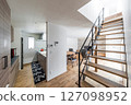 A natural, modern living/dining/kitchen space that makes the most of light and texture 127098952