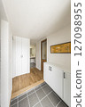 A simple and modern entrance hall that is both bright and functional 127098955