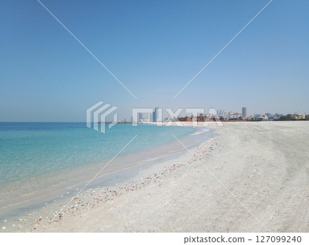 Beautiful View of Ajman. A serene and picturesque pristine beach in the United Arab Emirates. 127099240