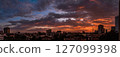 Luanda City Skyline at Sunset with Vibrant Clouds 127099398