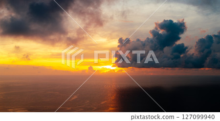 Golden Sunset Beam Reflecting on the Ocean Golden Sunset Beam Reflecting on the Ocean 127099940