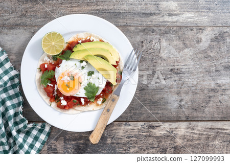 Huevos Rancheros. Traditional Mexican breakfast Huevos Rancheros. Traditional Mexican breakfast 127099993