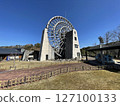 A huge wooden waterwheel standing in the countryside of Ena City 127100133