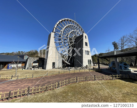 A huge wooden waterwheel standing in the countryside of Ena City A huge wooden waterwheel standing in the countryside of Ena City 127100133