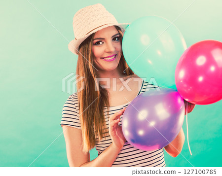 Woman summer joyful girl with colorful balloons Woman summer joyful girl with colorful balloons 127100785