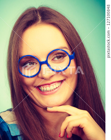 Happy smiling nerdy woman in weird glasses 127100848