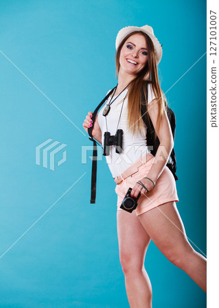 Tourist woman in summer hat portrait 127101007