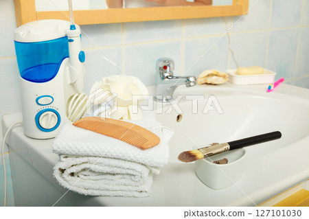 Closeup bathroom interior with sink and faucet 127101030
