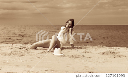 Happy woman on summer beach. Happy woman on summer beach. 127101093
