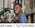 closeup of young african man, happy. closeup of young african man, happy. 127101460