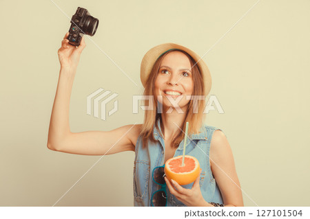 Woman taking selfie self picture with camera. 127101504