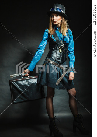 Steampunk girl with retro bag. Steampunk girl with retro bag. 127101518