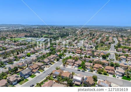 Aerial view of San Marcos neighborhood, with houses and street. South California Aerial view of San Marcos neighborhood, with houses and street. South California 127101619