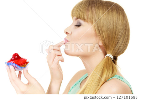 Woman holds cake strawberry cupcake Woman holds cake strawberry cupcake 127101683