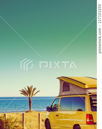 Camper van with tent on roof on beach Camper van with tent on roof on beach 127101850