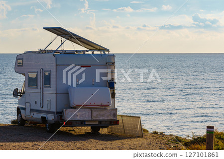 Caravan with tilt solar panels on roof. Caravan with tilt solar panels on roof. 127101861