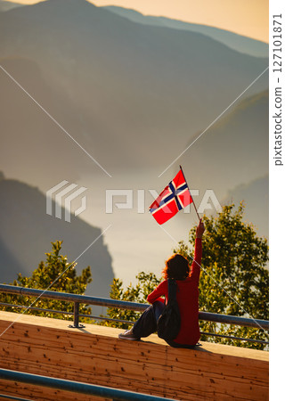 Tourist enjoy fjord view on Stegastein viewpoint Norway Tourist enjoy fjord view on Stegastein viewpoint Norway 127101871
