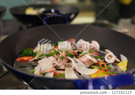 Stir fried clams with chili paste. Stir fried clams with chili paste. 127102125