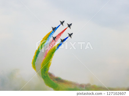 J-10 of China Air Force Aerobatics team on formations with colorful smokes venting from the plane. J-10 of China Air Force Aerobatics team on formations with colorful smokes venting from the plane. 127102607