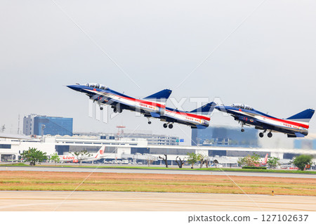 J-10 of China Air Force Aerobatics team on take off formations at airshow in Thailand. J-10 of China Air Force Aerobatics team on take off formations at airshow in Thailand. 127102637