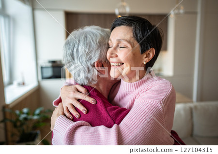 Happy excited missing woman lovingly hug husband celebrate reunion after separation. Love greetings 127104315