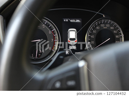 Activated park pilot system shows the distance to the object behind the car Activated park pilot system shows the distance to the object behind the car 127104432