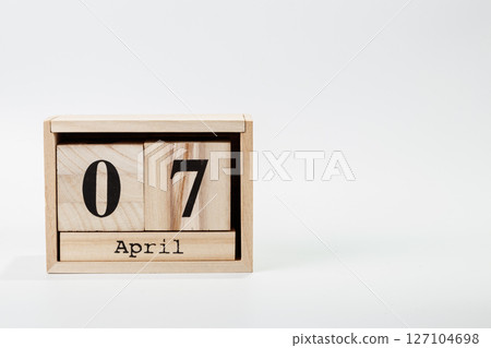 Wooden calendar April 07 on a white background 127104698