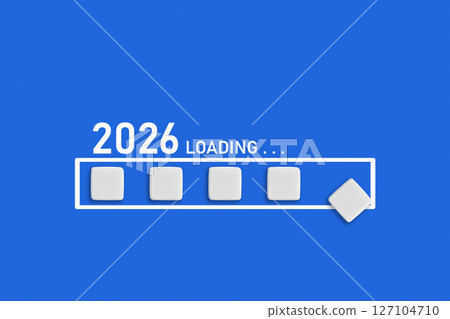 2026 Loading text on blue backdrop. Ideal for business planning, financial trends, and future economic concepts 127104710