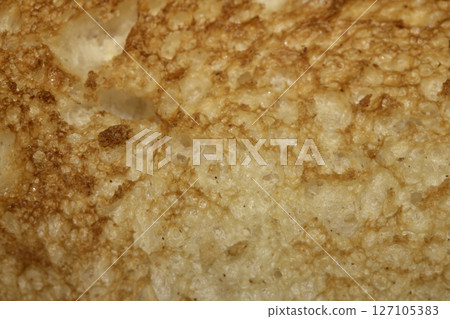 Close up of lightly toasted bread as a texture Close up of lightly toasted bread as a texture 127105383