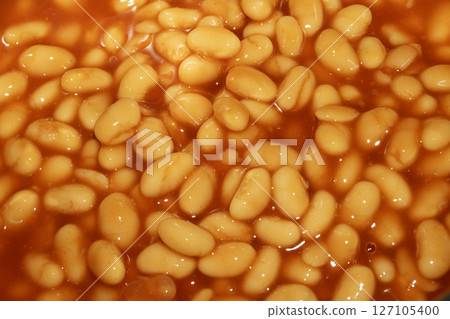 Close up of baked beans in tomato sauce Close up of baked beans in tomato sauce 127105400