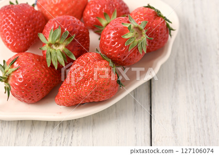Strawberries on a white table Strawberries on a white table 127106074