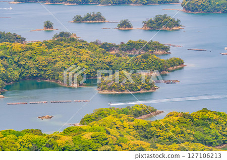 (Nagasaki Prefecture) Kujukushima, islands floating in Sasebo Bay. People enjoying water skiing. (Nagasaki Prefecture) Kujukushima, islands floating in Sasebo Bay. People enjoying water skiing. 127106213