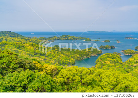 (Nagasaki Prefecture) Kujukushima, islands floating in Sasebo Bay, ships in the distance (Nagasaki Prefecture) Kujukushima, islands floating in Sasebo Bay, ships in the distance 127106262