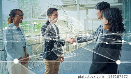 Multinational people shaking hands in lobby and global network concept Multinational people shaking hands in lobby and global network concept 127107272