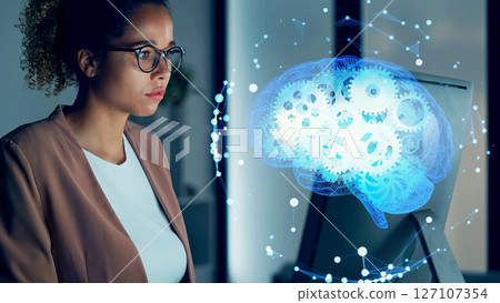 Conceptual visual of a foreign woman working in an office and artificial intelligence 127107354