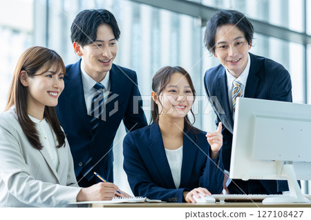 Businessmen working in an office. Filming cooperation: SKY Perfect Tokyo Media Center 127108427